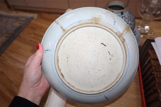 A Chinese blue and white deep plate decorated with a dragon and two other items